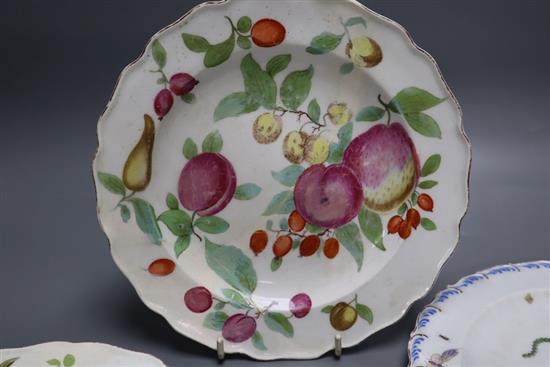 Four Chelsea fruit-painted plates c1755-60, one red anchor, two with brown anchor mark